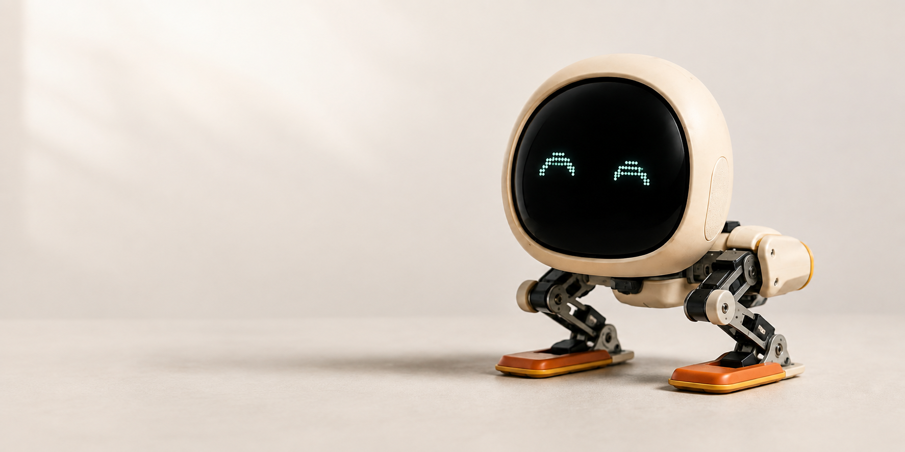 クリーム色のボディと表情のあるディスプレイを備えた卓上ロボットのコンセプト